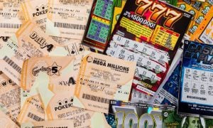 a pile of lottery draw and scratch tickets from michigan