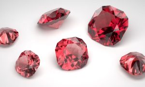 a collection of rubys on an off white background