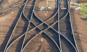railroad tracks crossing over one another