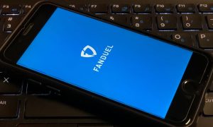 a mobile phone with fanduels logo on it