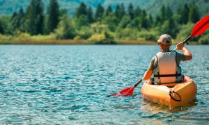 a lone kayaker in the water