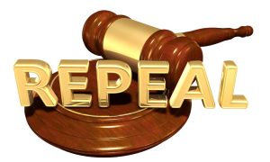 a gavel with the word repeal on it