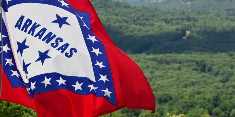 Arkansas State Flag Overlapping Forest Wilderness Landscape