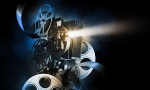 Film projector and movie reels