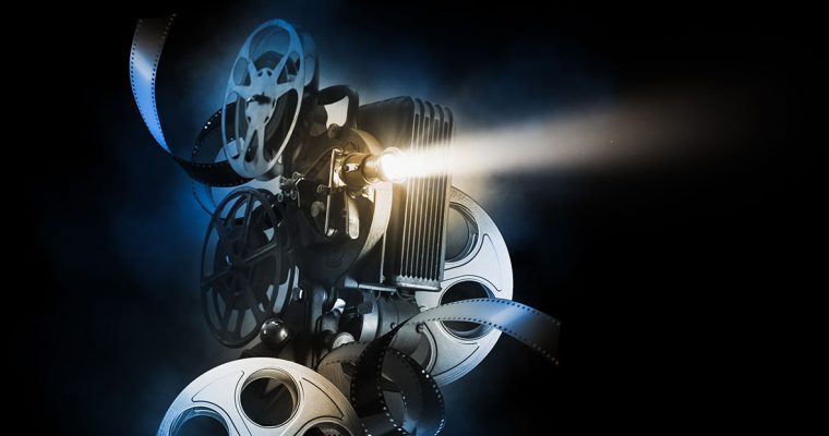 Film projector and movie reels