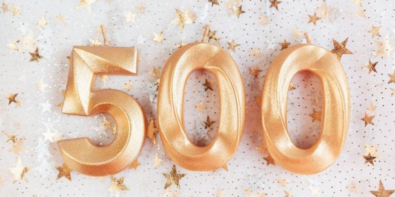 500 laid out in front of a bunch of golden stars