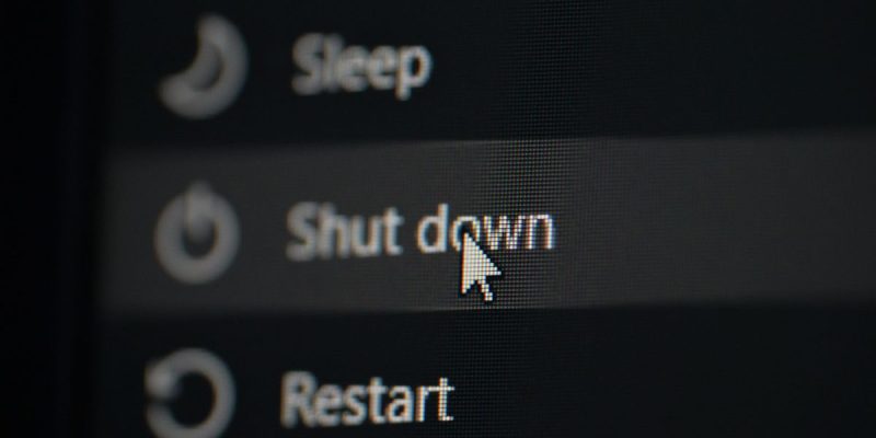 a computer screen highlighted over the shut down option while the sleep and restart options sandwhich it