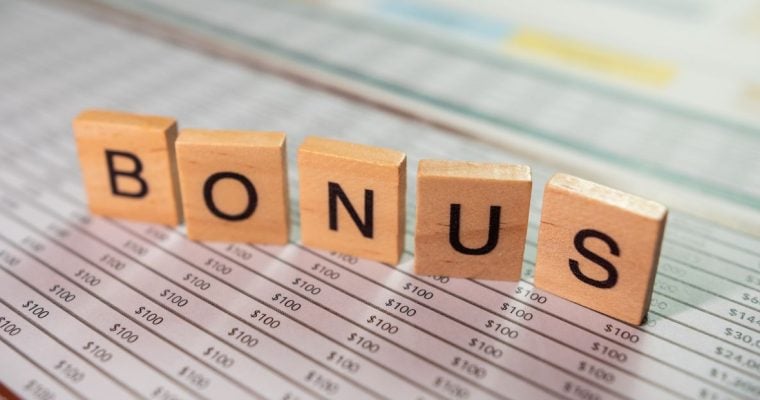 a series of scrabble tiles spelling out bonus