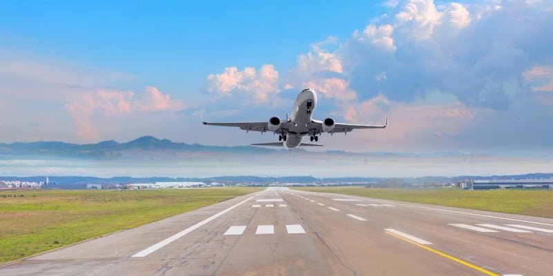 a plane taking off from a runway