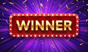 a game show screen with winner listed on it