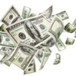 A picture of dollar bills representing the potential for huge jackpots on progressive slots