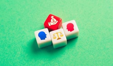 4 Dice Depict Legal Battle With Heads, Scale & Hand Holding Money Bag