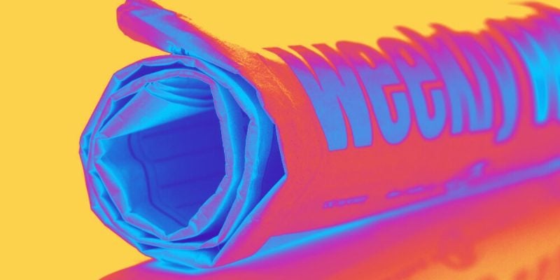 Rolled Up Weekly Newspaper in Neon Colored Filter