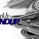 Stacked Newspapers With Weekly Roundup Text Overlay