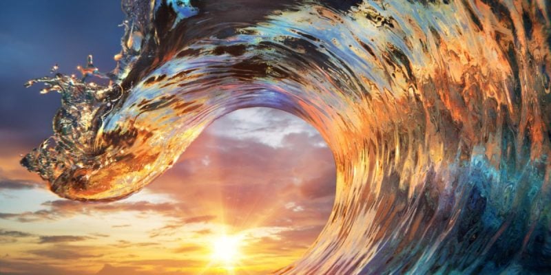 Title Wave with Clear Water Reflects Colors of Shining Sun