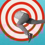 Man Jumps Through Red & White Target Graphic