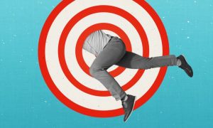 Man Jumps Through Red & White Target Graphic