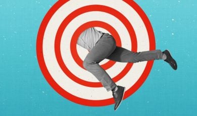 Man Jumps Through Red & White Target Graphic