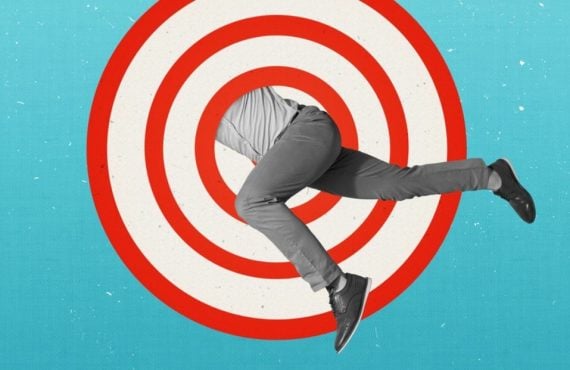 Man Jumps Through Red & White Target Graphic