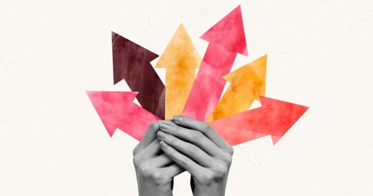 Collage Image of Hands Holding Variety of Colorful Arrows Pointing Upwards