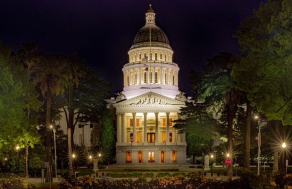 Well-Lit Entrance to the CA State Capital Building Surrounded By Trees