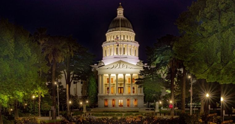 Well-Lit Entrance to the CA State Capital Building Surrounded By Trees