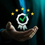 Man's Open Hands Hold Illustration of Certificate Awarded