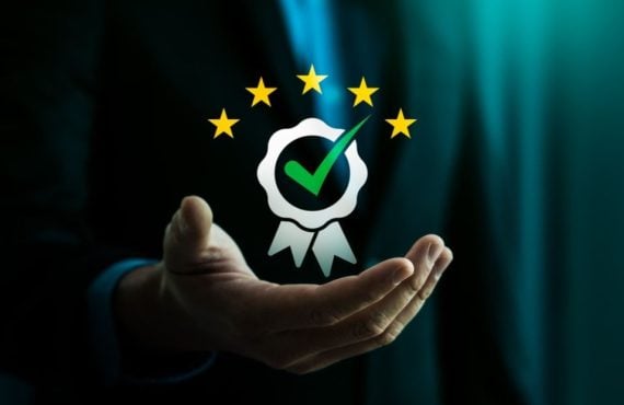 Man's Open Hands Hold Illustration of Certificate Awarded