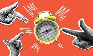 Buzzing Yellow Alarmclock with Three Hands Pointing