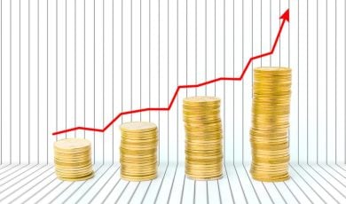 Piles of Gold Coins Increase from Left to Right With Red Arrow Above