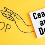 Sketched Hand and Word Stop with Caese and Desist