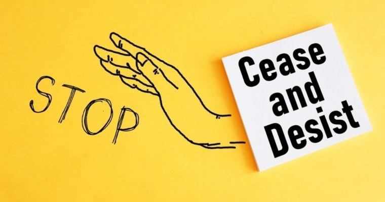 Sketched Hand and Word Stop with Caese and Desist