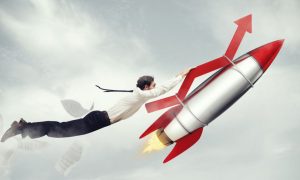 Red Financial Arrow Attached to Rocket Soars With Man Hanging On