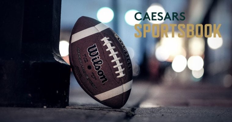 Caesars Sportsbook Logo Over Image of Standing American Football On Ground