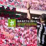 DraftKings Sportsbook Logo Over Image of Filled American Football Stadium with Referee Signaling Touchdown