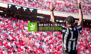 DraftKings Sportsbook Logo Over Image of Filled American Football Stadium with Referee Signaling Touchdown