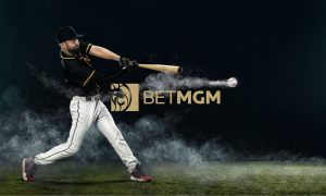 BetMGM Logo Sits Beneath Swinging Baseball Player Hitting Baseball on Field