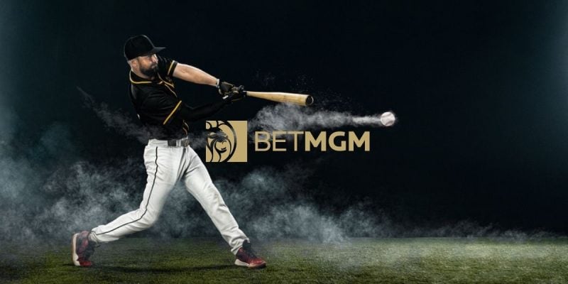 BetMGM Logo Sits Beneath Swinging Baseball Player Hitting Baseball on Field