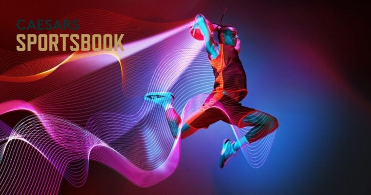 Jumping Basketball Player in Red with Caesars Sportsbook Logo