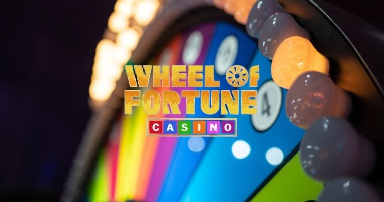 Wheel of Fortune Casino Logo Over Colorful Arcade Style Gambling Wheel