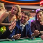 In Casino, Glamorous Players Place Bets, Reveal Cards, Player Triumphs