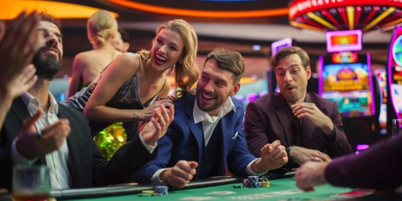 In Casino, Glamorous Players Place Bets, Reveal Cards, Player Triumphs