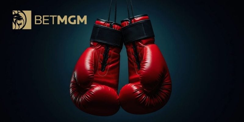 BetMGM Logo Over Image of A Pair of Hanging Red Boxing Gloves