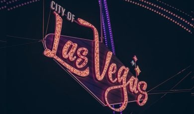 Brightly Lit City of Las Vegas Marquee Against Night Sky