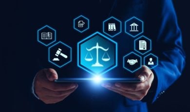 Digital Images of Law and Regulations Hover Above iPad in Man's Hands