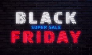 Neon Sign Reads "Black Friday Super Sale" in Red White and Blue