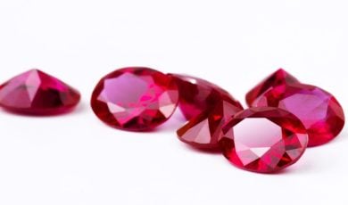 Bunch of Bright Red Rubies Lay on White Background
