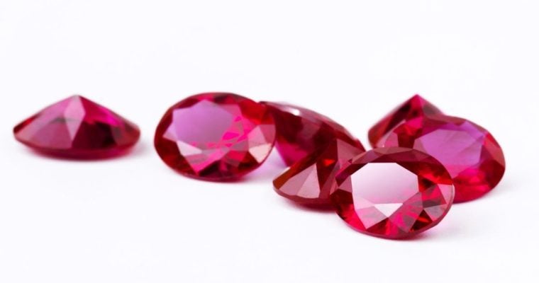 Bunch of Bright Red Rubies Lay on White Background
