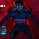 FanDuel Logo Over Image of American Football Player In Wide Stance Holding Football