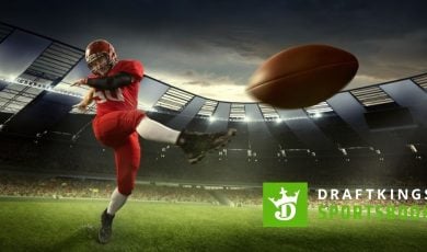 DraftKings Sportsbook Logo Over Image of American Football Player Kicking Football Inside Stadium
